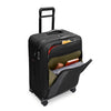 Black Briggs & Riley suitcase with front pockets packed on white background