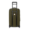 Green Briggs & Riley suitcase with a visible brand logo on a white background