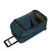 Blue Briggs & Riley suitcase with open compartment on a white background