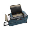 Open blue Briggs & Riley suitcase with interior view on a white background