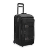Black Briggs & Riley suitcase with wheels on a white background