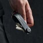 in hand graphite Orbitkey Active Key Organizer