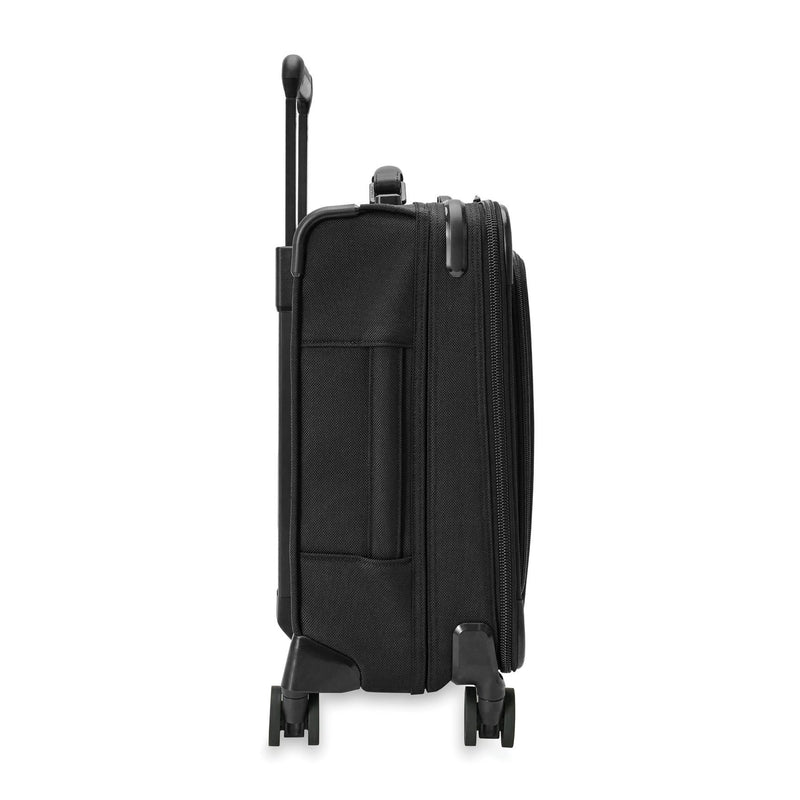 Side of black Briggs & Riley Baseline Compact Carry-On Spinner