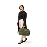 Model with Baseline Expandable Cabin Bag in Olive