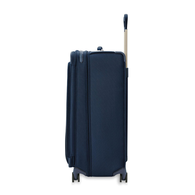 Side of Navy Briggs & Riley Baseline Extra Large Spinner
