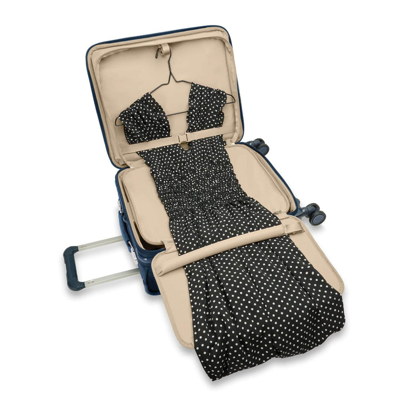 Garment sleeve of navy Briggs & Riley Baseline Global Carry-On Spinner