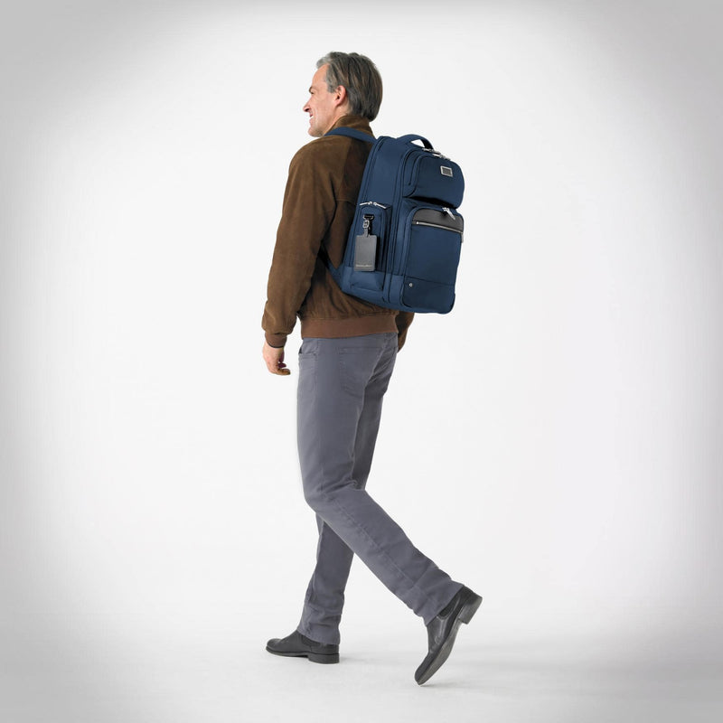 Model with navy Briggs @work Large Cargo Backpack