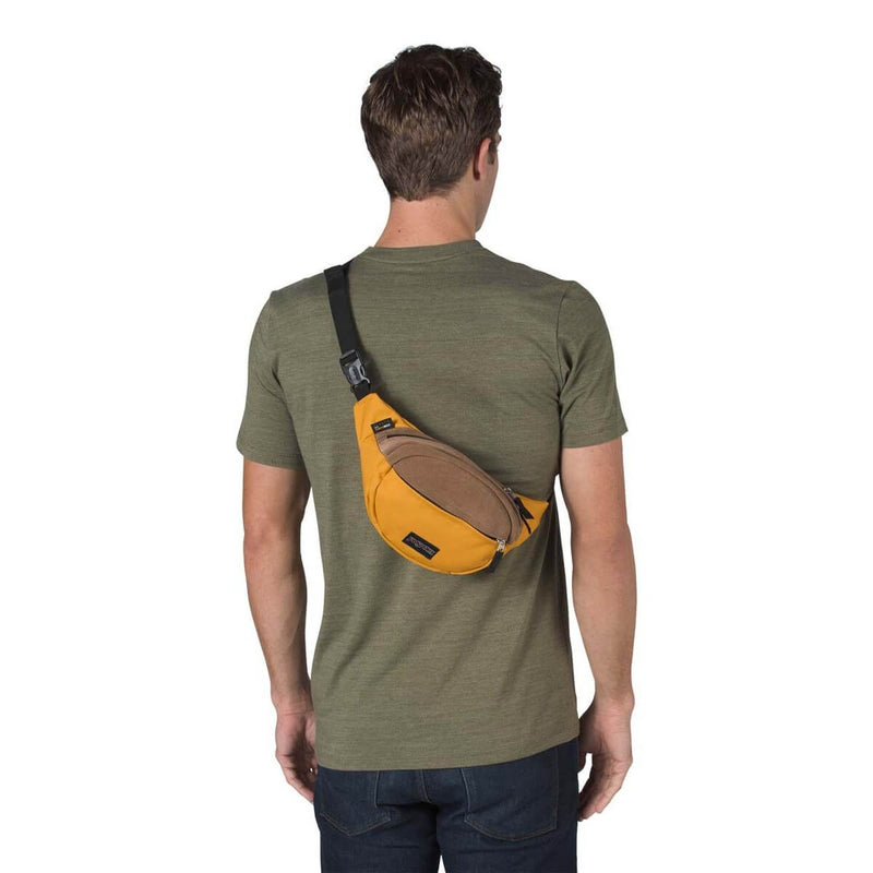 JanSport Fifth Ave Suede Fanny Pack in English Mustard on model