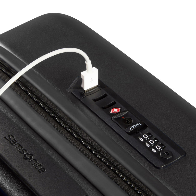 USB port of black Samsonite Stackd Spinner Carry-on Expandable