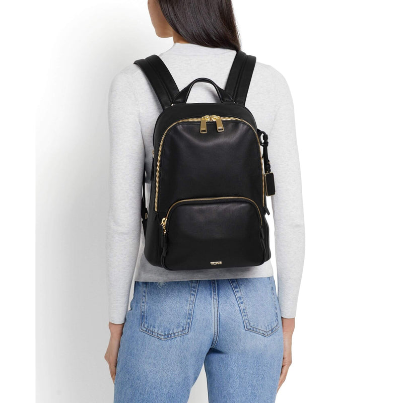 TUMI Voyageur Women's Hannah Backpack in black-gold on model
