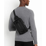 TUMI Bravo Platoon Sling in Black on model