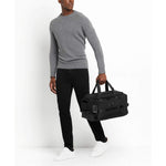 TUMI Bravo Mason Duffle in Black on model